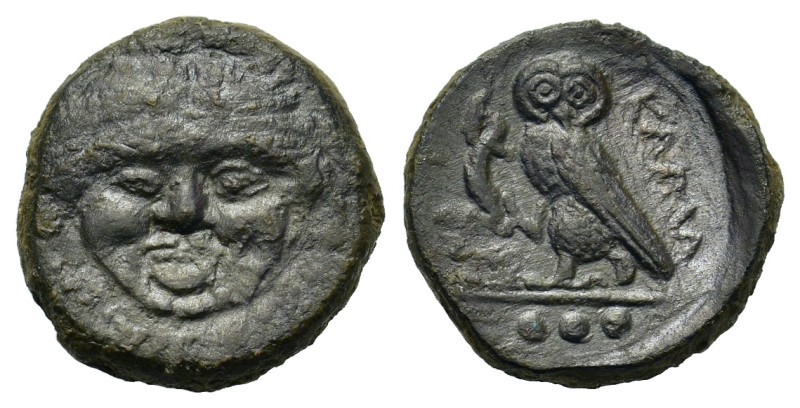 Sicily, Kamarina, c. 420-405 BC. Æ Tetras (15,2mm, 3g). Facing gorgoneion. R/ Ow...