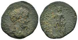 Septimius Severus (193-211). Arcadia, Mantinea. Æ Diassarion (22mm, 6,00g). Laureate head right. R/ Dionysus standing left, resting arm on tree trunk,...