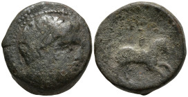 KINGS OF MACEDON. Philip II (359-336 BC). Uncertain Macedonian mint
AE Bronze (19.1mm 8.16g)
Obv: Diademed head of Apollo right; A behind
Rev: Yout...
