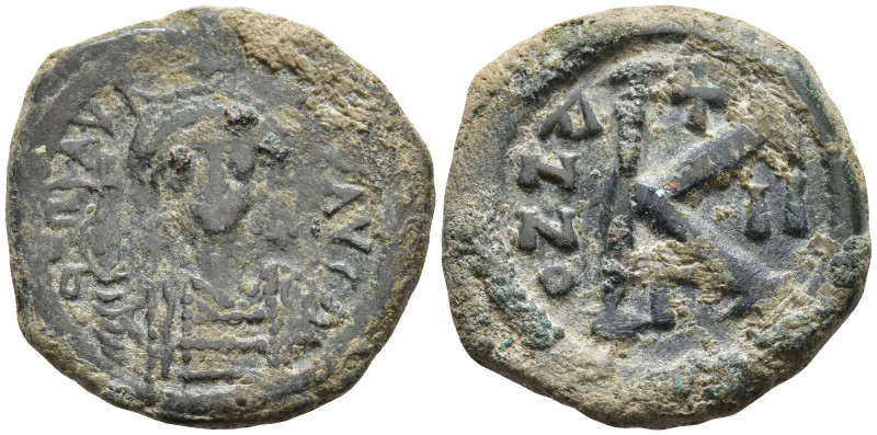 Maurice Tiberius (582-602 AD). Constantinople
AE Half Follis (23.2mm 6.91g)
Ob...