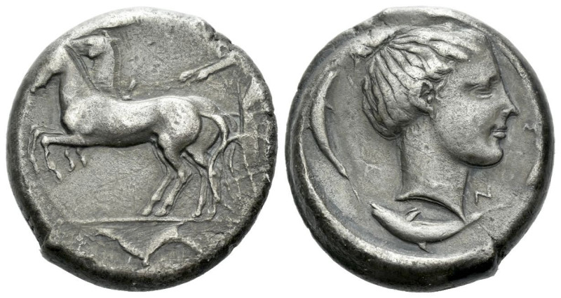 Sicily, Syracuse Tetradrachm circa 440-430, AR 24.00 mm., 17.11 g.
Fast quadrig...