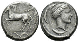 Sicily, Syracuse Tetradrachm circa 440-430, AR 24.00 mm., 17.11 g.
Fast quadriga l. driven by charioteer, holding kentron and reins; above, Nike flyi...