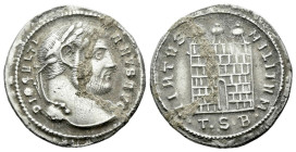 Diocletian, 284-305 Argenteus Thessalonica circa 302, AR 19.00 mm., 3.28 g.
Laureate head r. Rev. Campgate with three turrets and no doors; below, •T...