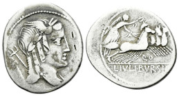 L. Iulius Bursio. Denarius circa 85, AR 18.40 mm., 3.74 g.
Male head r., with the attributes of Apollo, Mercury and Neptune; behind, bucranium. Rev. ...