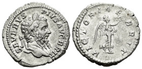 Septimius Severus, 193-211 Denarius Rome 210, AR 18.00 mm., 2.82 g.
Laureate head r. Rev. Victory advancing r., holding palm frond and wreath. RIC 33...