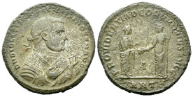 Diocletian, 284-305 Follis Antiochia 308, Æ 27.00 mm., 10.53 g.
Laureate and mantled bust r., holding olive branch in his r. hand and mappa in his l....