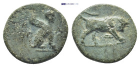 Caria, Kaunos. Ca. 350-300 B.C. AE(14mm, 1.32 g). K-A, Sphinx seated right. / Bull butting right.