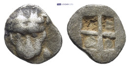 Cimmerian Bosporos, Pantikapaion. AR Obol, (8mm, 0.58 g). Circa 480-470 BC. Obv: Facing head of lion. Rev: Quadripartite incuse square.