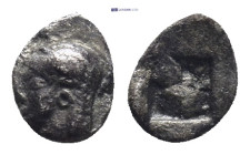 IONIA, Kolophon. Late 6th century BC. AR Tetartemorion (7mm, 0.16 g). Archaic head of Apollo left / Quadripartite incuse square.
