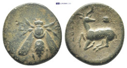 IONIA. Ephesos.(4th century BC).Ae. (15mm, 2.62 g) Obv : Ε - Φ. Bee. Rev : Stag kneeling left, head right; astragalos above.