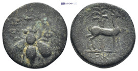 Ionia. Ephesos circa 202-133 BC. Bronze Æ (18mm., 4.63 g). E-Φ, bee within wreath / [Unclear magistrate's name], stag standing right before palm tree,...