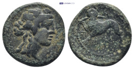 LYDIA, Sardes. (2nd-1st centuries BC). AE. (18mm, 4.58 g) Head of Dionysos, right; wearing ivy wreath. Rev. Horned lion standing left, head facing, br...