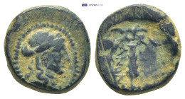 Lydia, Sardeis, 2nd-1st century BC. Æ (15mm, 5.2 g) Obv: Laureate head of Apollo. Rev: Ethnic around club within wreath; monogram to r.