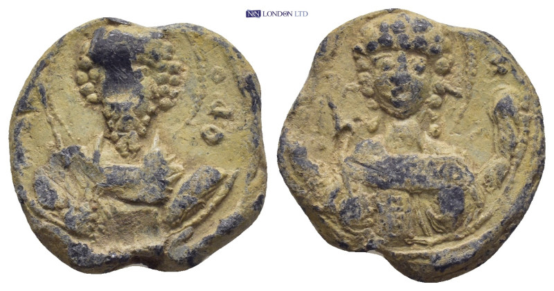 BYZANTINE LEAD SEAL. (19MM, 8.4 G) Nimbate bust of Saint Theodore facing, holdin...