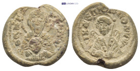 BYZANTINE LEAD SEAL. (20mm, 5.38 g) Obv: Nimbate bust of Mary, medallion with face of Christ on chest. Rev: Bust of archangel.