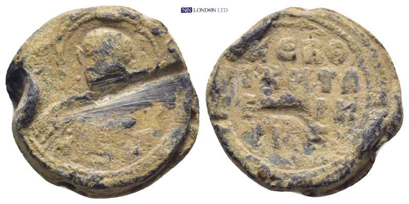 BYZANTINE LEAD SEAL. (21MM, 13.5 G) Circa 8 - 9 th Century.PB Seal. Facing nimba...