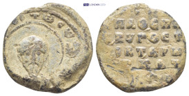 BYZANTINE LEAD SEAL. (22mm, 8.34 g) Obv:Nimbate bust of saint facing. Rev: Legend in 5 lines.