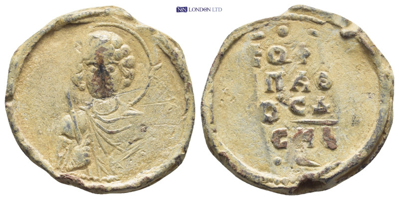 BYZANTINE LEAD SEAL. (25mm, 9.3 g) Obv: Bust of St. Michael holding a sceptre Re...