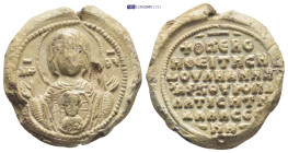 BYZANTINE LEAD SEAL. (26mm, 21.6 g) Obv: Facing bust of the Virgin Mary, with Christ medallion on breast.monogram to left and right. Rev: Legend in 7 ...