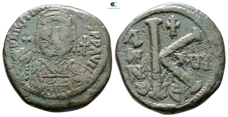 Justinian I AD 527-565. Constantinople
Half Follis or 20 Nummi Æ

26 mm, 9,68...