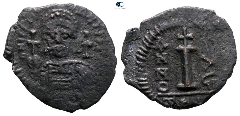 Justinian I AD 527-565. Theoupolis (Antioch)
Decanummium Æ

25 mm, 4,17 g

...