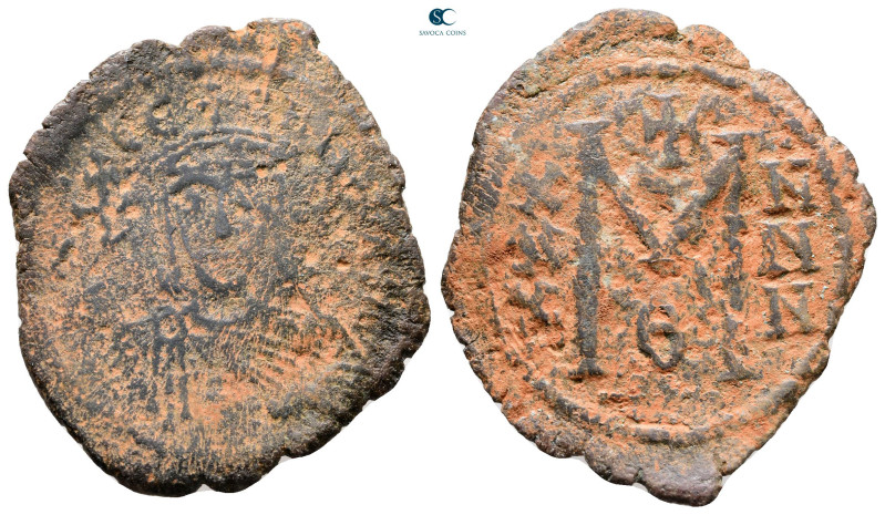 Theophilus AD 829-842. Constantinople
Follis or 40 Nummi Æ

31 mm, 5,47 g

...