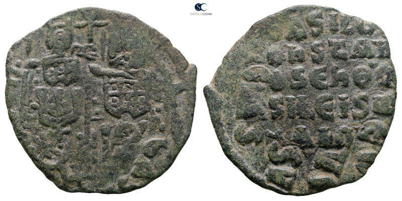 Basil I the Macedonian, with Constantine AD 867-886. Constantinople
Follis Æ
...