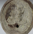 Roman oil lamp depicting a erotic scene, Type Bussière B III 1b