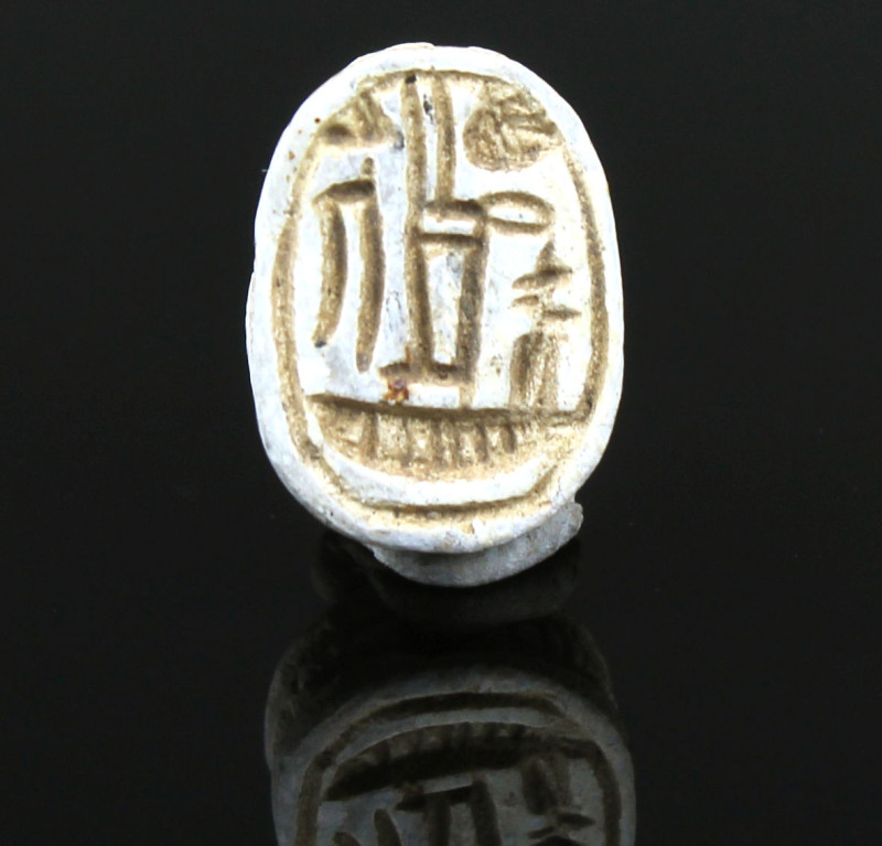 ITEM: Scarab with representation of uraeus-serpent above neb-figure (“lord”), pr...