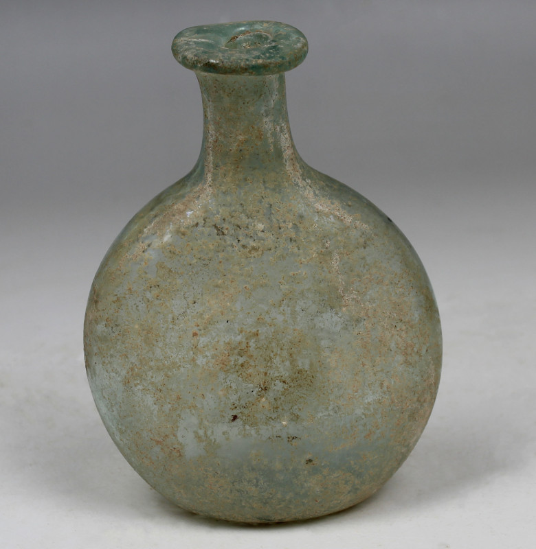 ITEM: Flask
 MATERIAL: Glass
 CULTURE: Roman
 PERIOD: 1st - 3rd Century A.D
...