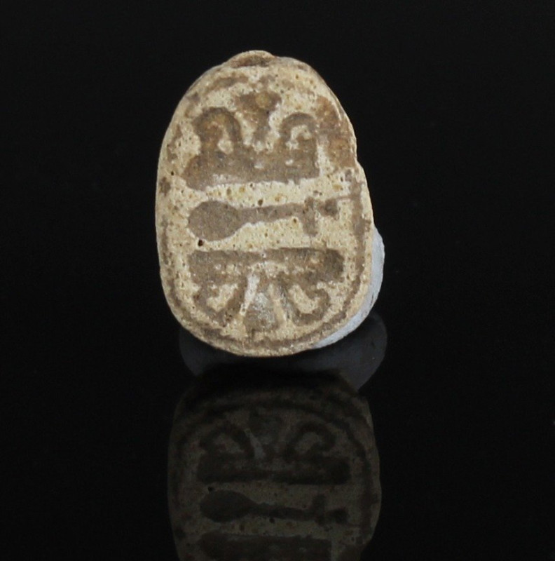 ITEM: Scarab with nefer-sign flanked by bent papyrus stalks
 MATERIAL: Steatite...