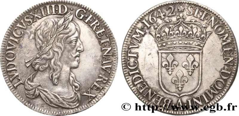 LOUIS XIII
Type : Écu d’argent, 2e type, 1er poinçon de Warin 
Date : 1642 
M...