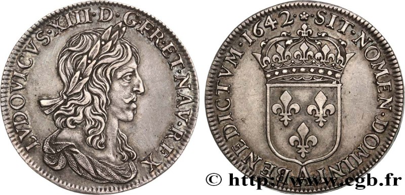 LOUIS XIII
Type : Demi-écu, 2e type, 1er poinçon de Warin 
Date : 1642 
Mint ...