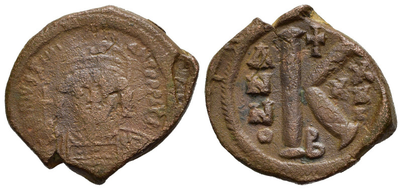 GIUSTINIANO I (527-565). Costantinopoli. Mezzo follis. 557-558 circa. AE (8,27 g...