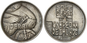 Spanish Medals

Campeona del Mundo. 1969. DERBI 50 cc. Anv.: Motorista a derecha. Rev.: Leyenda y radios de rueda. Metal plateado. Ø 80 mm. EBC.