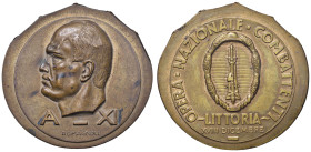 MEDAGLIE FASCISTE Medaglia A. XI Opera Nazionale Combattenti, Littoria - Opus: Romagnoli - AE (g 51,13 - Ø 55 mm) Curioso tondello irregolare ed allar...