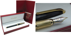 CARTIER Louis Cartier -Penna Stilografica- Numero di serie 027745.Corpo e cappuccio in “composite” nero. Finiture placcate in oro. Caratteristica piet...