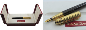 PASHA DE CARTIER -Penna Stilografica- Numero di serie 8023. Corpo in resina nera e cappuccio (con classico intarsio) placcato in oro giallo con caratt...