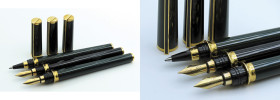 S.T. DUPONT -Lotto di 3 penne- N.1 Roller, n.2 Stilografiche. Corpi in resina verde (roller) e resina nera con finiture dorate. Stilografiche con rica...
