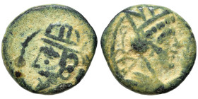 KINGS of PARTHIA. Chalkous (bronze, 1.20 g, 11 mm). Diademed and draped bust left. Rev. Turreted bust of Tyche right, palm branch (?) to right. Nearly...