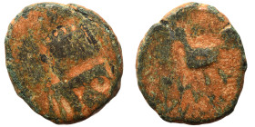 Greek. Ae (bronze, 3.94 g, 17 mm). Turreted head right. Rev. Bird (?) standing left. Fine.