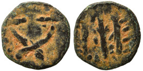Greek (?). Ae (bronze, 0.32 g, 9 mm). Crossed cornucopiae. Rev. Uncertain. Nearly very fine.