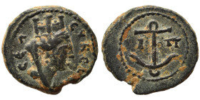 SYRIA. Seleucia. 1st century AD. Ae (bronze, 2.57 g, 14 mm), year 81 = AD 50/1. ϹΕΛΕΥΚΕΩ Veiled and turreted head of Tyche right. Rev. Ι-Π Anchor. Lin...