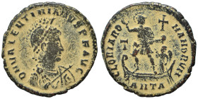 Valentinian II, 375-392. Ae (bronze, 4.89 g, 23 mm), Antioch. D N VALENTINIANVS P F AVG Helmeted, diademed, draped and cuirassed bust right, holding s...
