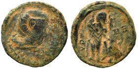 Uncertain. Ae (bronze, 1.81 g, 15 mm). Draped bust right. Rev. Emperor (?) standing, holding spear. Fine.