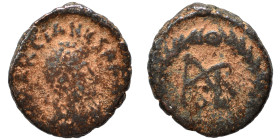Marcian, 450-457. Nummus (bronze, 1.10 g, 11 mm). D N MARCIANVS P F AV Diademed, draped and cuirassed bust right. Rev. Monogram in wreath. Nearly very...