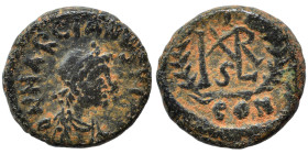 Marcian, 450-457. Nummus (bronze, 0.90 g, 10 mm), Constantinople. D N MARCIANVS P F AV Diademed, draped and cuirassed bust right. Rev. Monogram in wre...