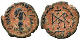 Marcian, 450-457. Nummus (bronze, 1.19 g, 10 mm). D N MARCIANVS P F AV Diademed, draped and cuirassed bust right. Rev. Monogram in wreath. Nearly very...