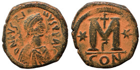 Justin I, 518-527. Follis (bronze, 17.19 g, 32 mm), Constantinople. DN IVSTINVS PP AVG Diademed, draped, and cuirassed bust right. Rev. Large M; cross...