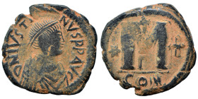 Justin I, 518-527. Follis (bronze, 16.71 g, 31 mm), Constantinople. DN IVSTINVS PP AVG Diademed, draped, and cuirassed bust right. Rev. Large M; cross...